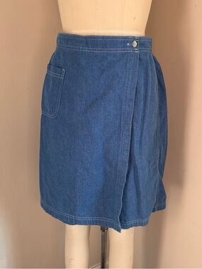 Vintage Blue denim skirt/ skort with button closure and a pocket.